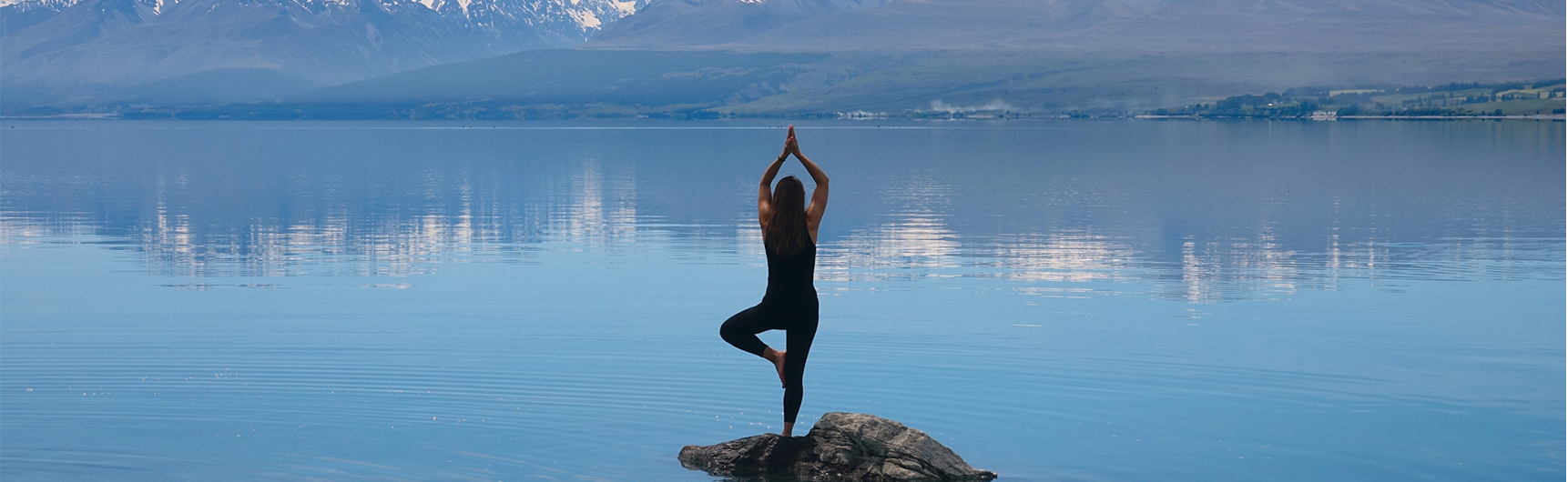 Lady standing on rock