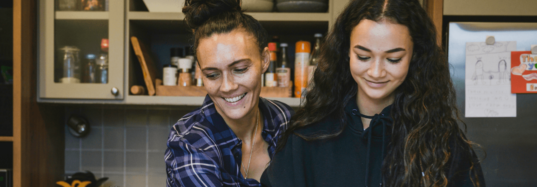 Father and son prepare a meal