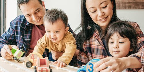 Southern Cross Health Insurance - UltraCare mobile banner A family playing with wooden toy cars