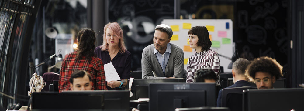 Business continuity Team of people meeting in an office